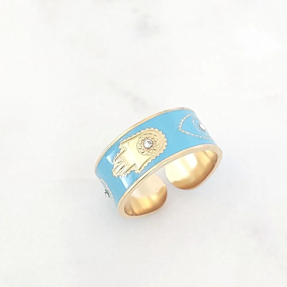 Bague jonc turquoise en acier inoxydable – Motif main de Fatma dorée