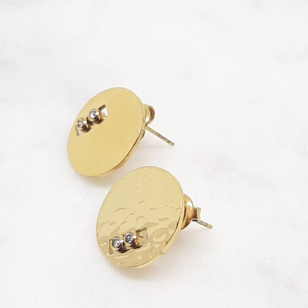 Puces d'oreilles martelées dorées avec deux brillants