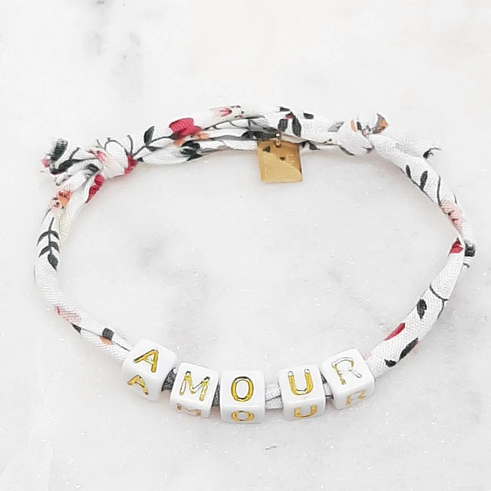 Bracelet fleuri blanc "Amour"
