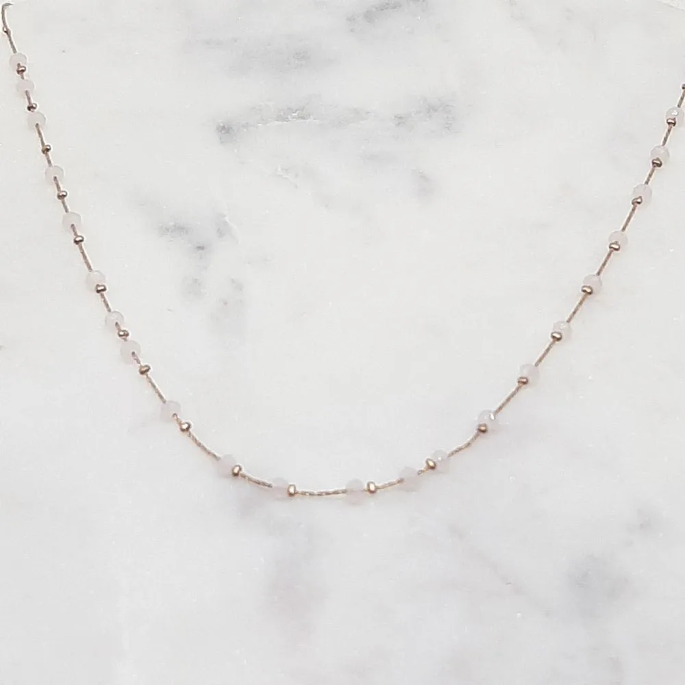 Collier perles fines blanches (or rose)