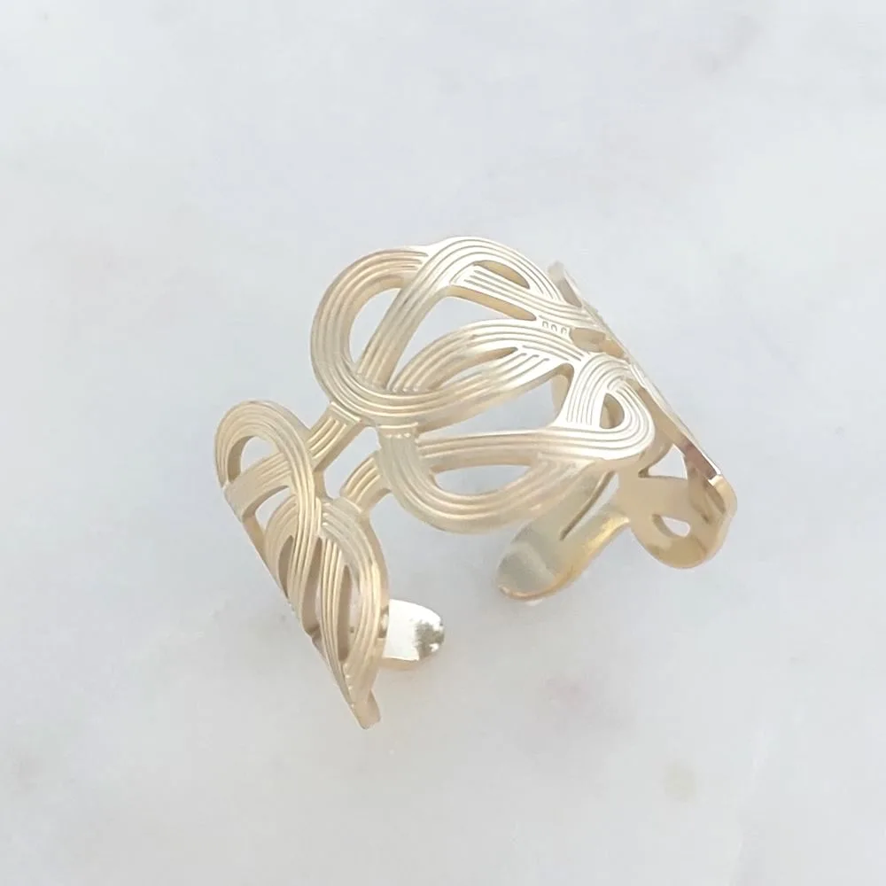 Bague Eva en acier inoxydable doré – Motif entrelacé