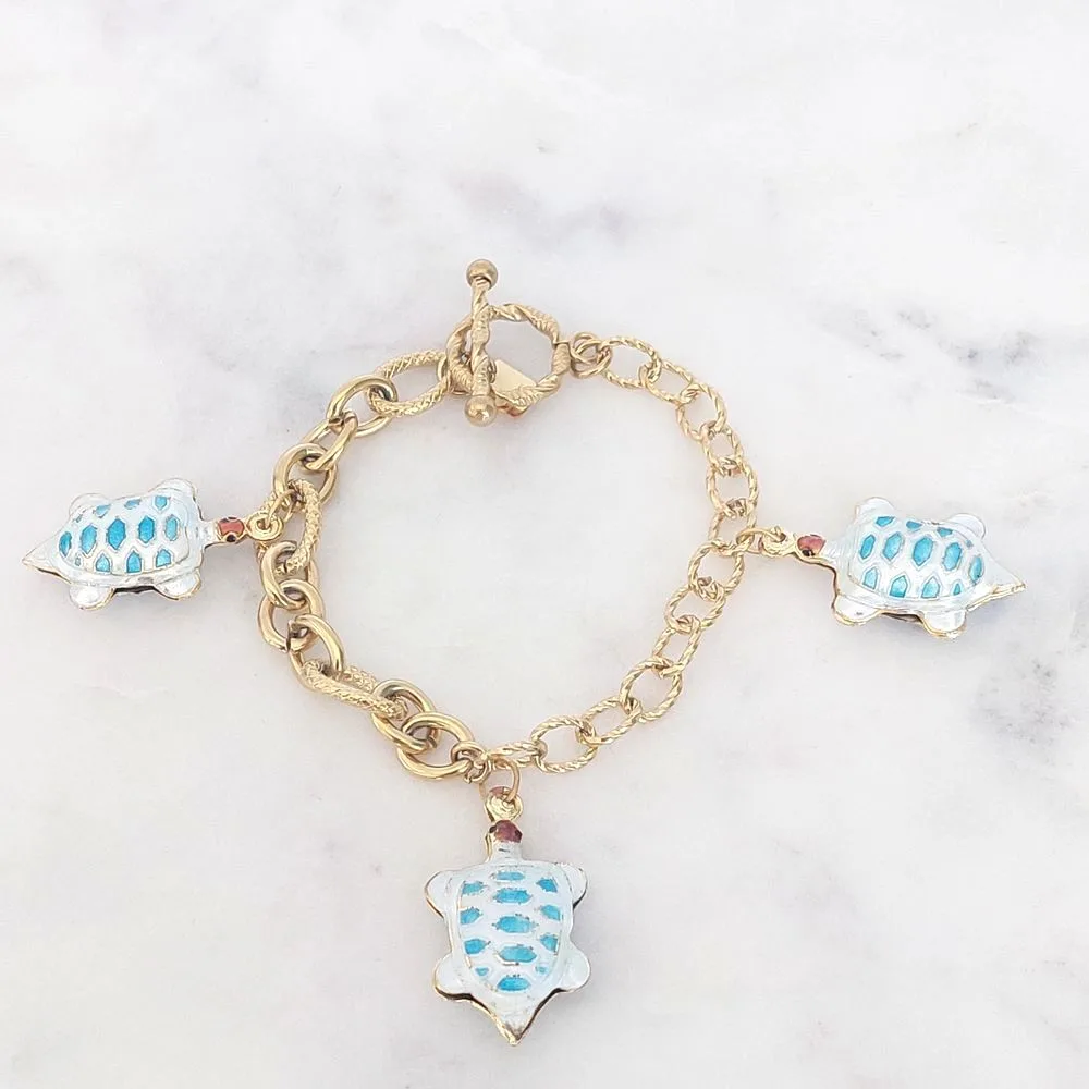 Bracelet avec breloques Tortues (doré)