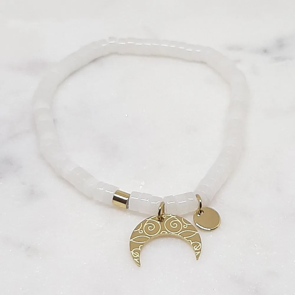 Bracelet élastique en howlite blanc avec médaillon Lune