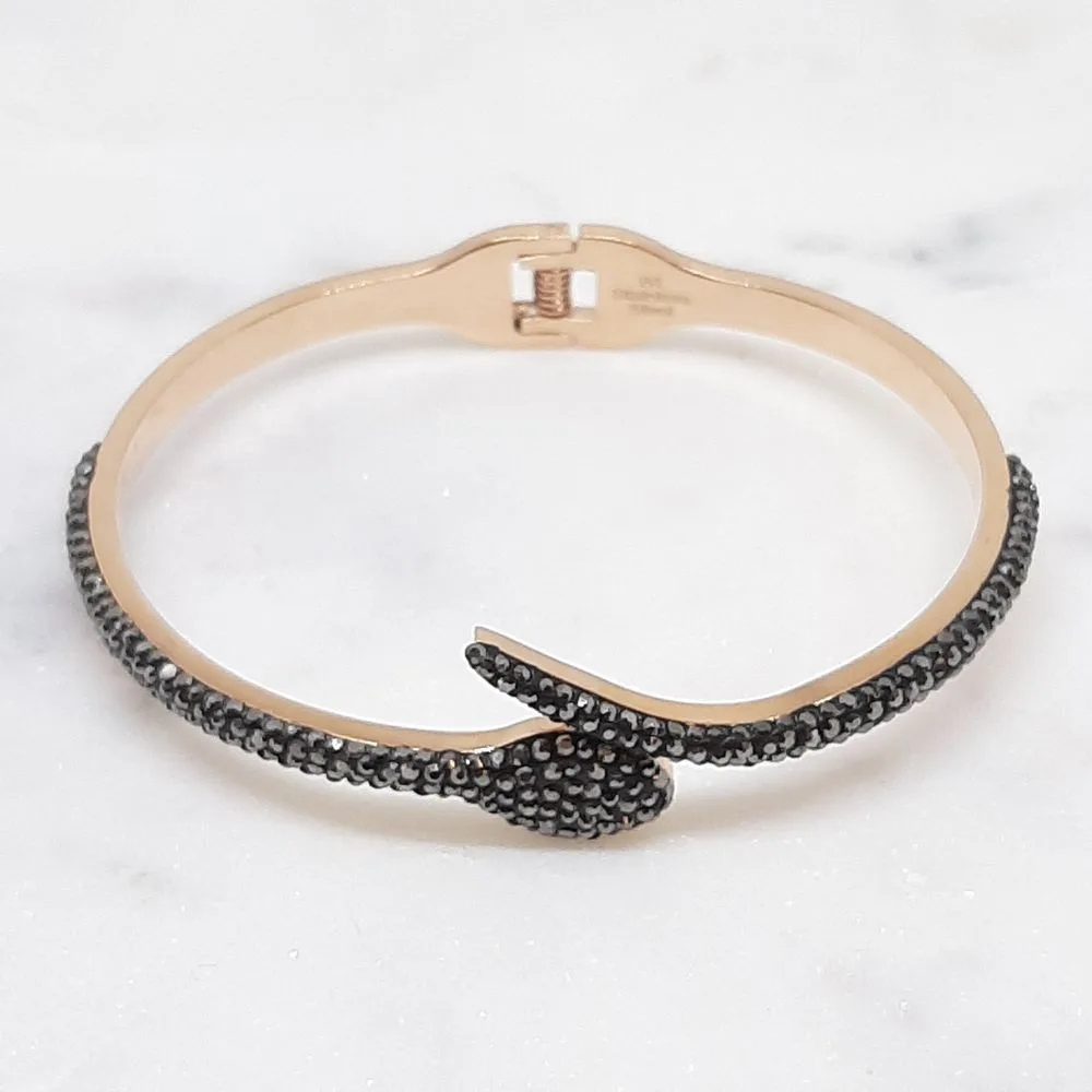 Bracelet serpent doré or rose et diamants noirs