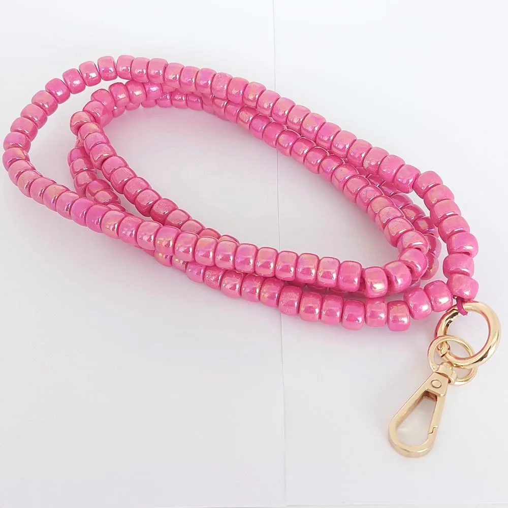 Collier téléphone perle rose fuschia