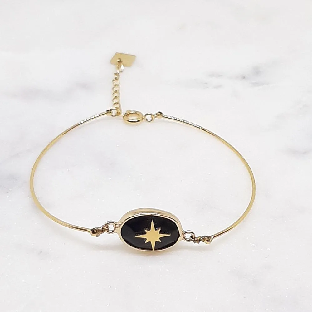 Bracelet jonc en émail noir avec étoile dorée