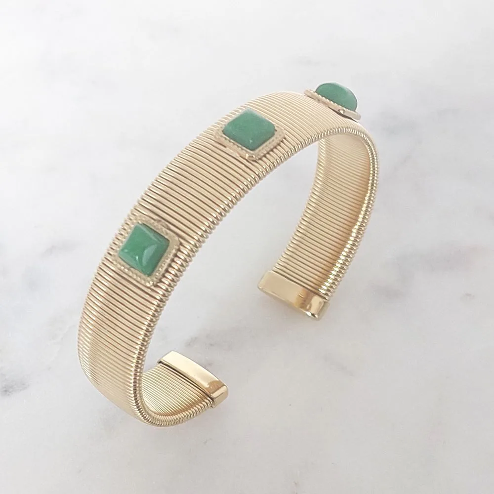 Bracelet jonc doré avec cabochons (verts)
