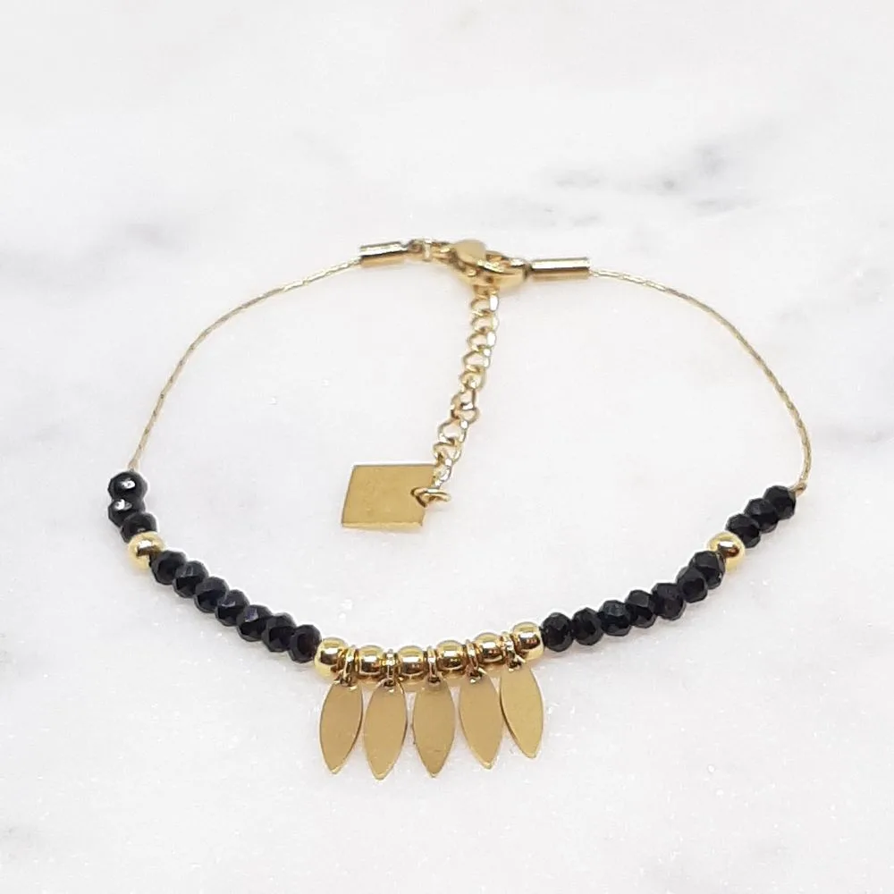 Bracelet fin avec pampilles dorées