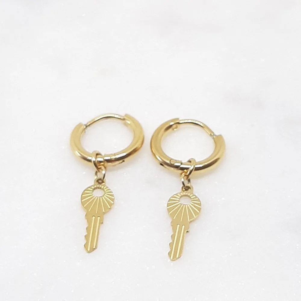 Boucles d'oreilles créoles "clef" (doré)