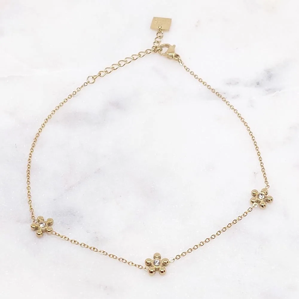 Bracelet de cheville dorée à fleurs